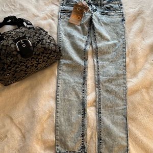 Women’s high waisted stretch acid wash jeans